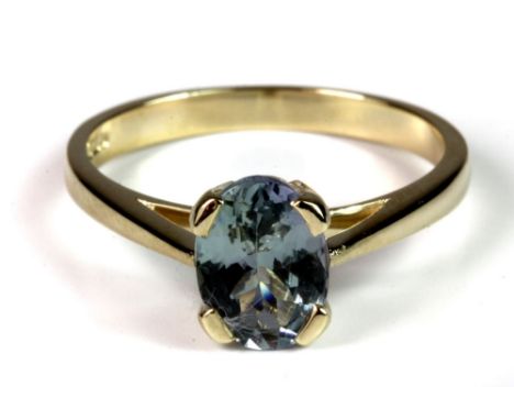 A 9ct gold ring with an oval cut light blue tanzanite, (1.32ct), (N.5).