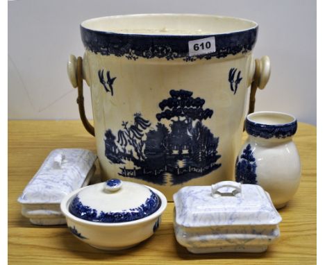 A ceramic Willow pattern pail and lid, together with four other items.