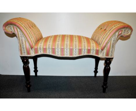 An upholstered ornate stool, W. 102cm.