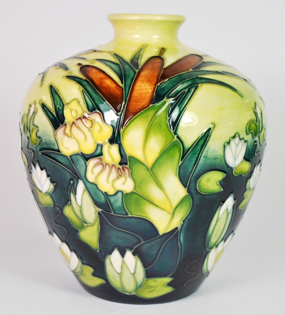 A Moorcroft 'Lamia' pattern vase decorated with bulrushes and water ...