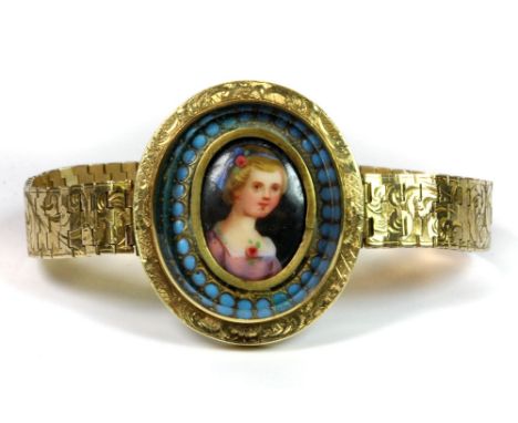 A gold mounted hand painted portrait miniature of a girl engraved on the back Mrs PW Martin Jr set into a later hinged yellow