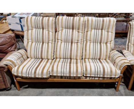 Ercol Saville light elm framed matching three-seater sofa, model no.9303,&nbsp;with striped brown, yellow and green upholster