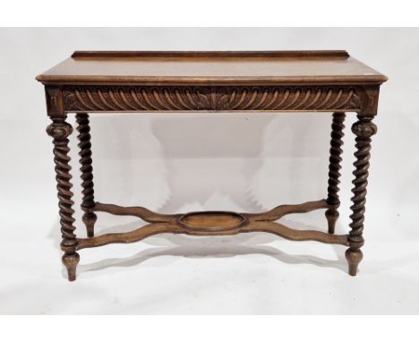 Victorian oak hall table/buffet, the two cushion drawers with gadrooned carving, raised on barleytwist supports united by a s