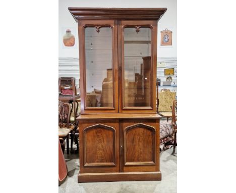 Victorian mahogany library bookcase&nbsp;with moulded cornice over two glazed doors opening to four adjustable shelves, the l