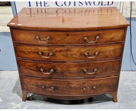 Early 19th century mahogany bowfronted gentleman's dressing chest, the top with satinwood string inlay, the top cockbeaded lo