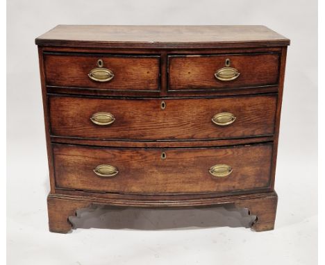 George III oak bowfronted chest of two short over two long graduating cockbeaded drawers, the top with reeded carved edge, th