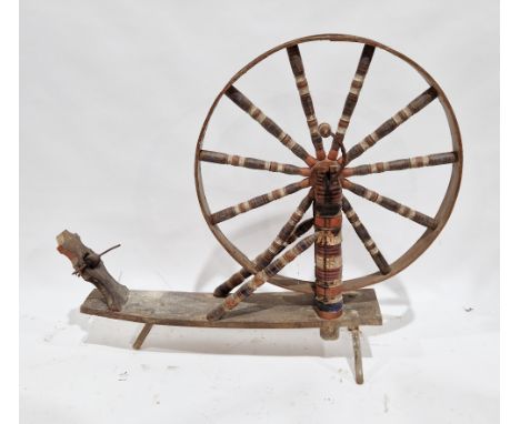 Antique Folk Art wooden Distaff spinning wheel, the spindles and support with painted striped and floral decoration and raise