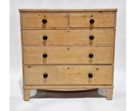 Early 19th century pine chest of two short and three graduating long drawers, with turned ebony handles and raised on bracket