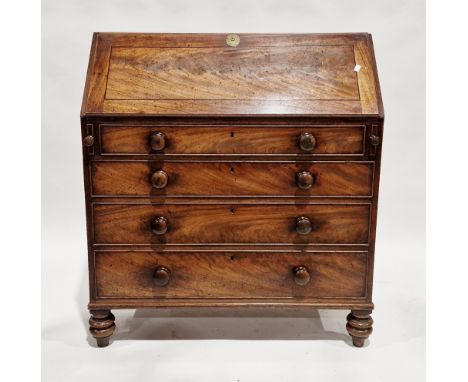 George III mahogany bureau, the sloping drop front opening to a fitted interior of drawers and pigeonholes, over four graduat