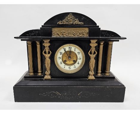 Victorian slate 8 day mantel clock of architectural form, the white enamel and gilt dial with Arabic numerals, with key, 36cm