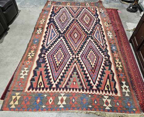 Flat weave kilim, diamond designs to centre in light blue, dark blue, green, reds, creams, black, 350cm x 185cm&nbsp;