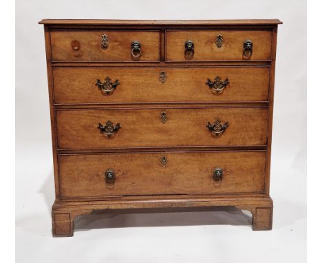 Early 19th century mahogany and string inlaid chest of drawers, the crossbanded top with ogee moulded rim, having two short a