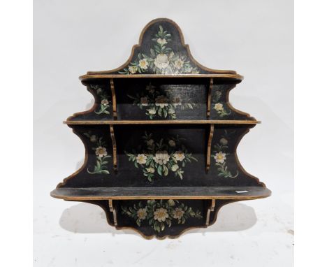 Early 20th century wooden painted hanging wall shelf comprising three graduating tiers held on a shaped backplate handpainted