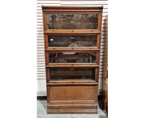 Late 19th century Globe Wernicke sectional stacking bookcase&nbsp;with four glazed up and over doors above a further single p