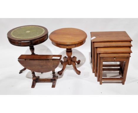 Four items of furniture&nbsp;including a brass inlaid mahogany nest of four tables, largest 53cm wide x 53cm high, a brass in