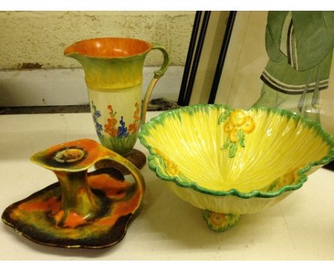 An Art Deco Myott & Son hand painted jug decorated with Hollyhocks together with an Art Deco Crown Ducal salad bowl and chamb