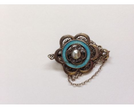 A PRIVATE COLLECTION OF GOLD AND JEWELLERY ITEMS.

A silver and enamel pendant set with a blister pear.