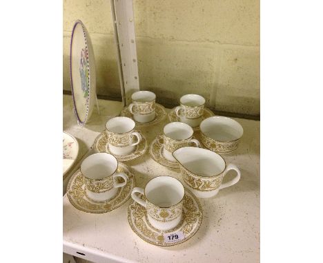 A Royal Worcester bone china teaset decorated in the Hyde Park pattern, complete for six with milk jug and sugar bowl.