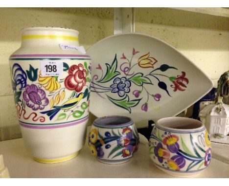 A white bodied Poole Pottery vase decorated in the LE pattern together with a dish and two jam pot bases.