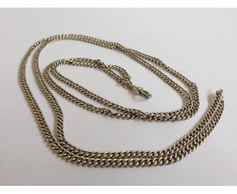 A 56" long silver guard chain (95.6 grams).