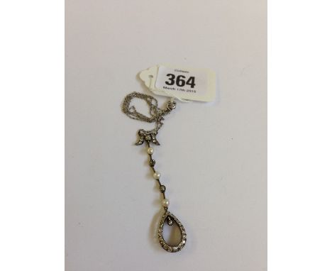 A diamond and pearl set pendant and chain.