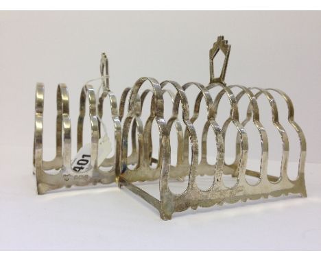 A pair of early 20th century silver toast racks.