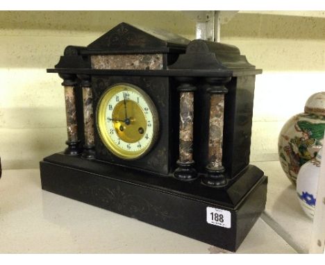 A late 19th century marble and slate cased architectural mantle clock.