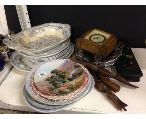 A collection of blue and white china plates together with a silver plated fruit bowl, electric mantle clock and other items.