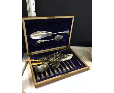 A canteen of fish knives and forks (one fork missing) together with other cutlery items.