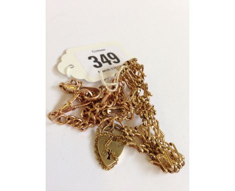 A 9 carat gold gate bracelet with padlock together with a short 9 carat gold fob chain (26.6 grams overall).