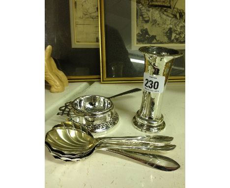 A small silver spill vase together with a plated strainer and a set of spoons.