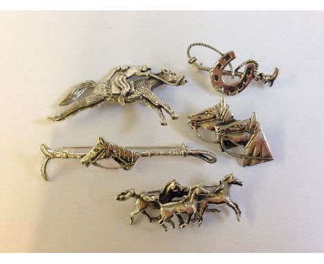 Five silver stock pins, decorated with Horses and horse related motifs.