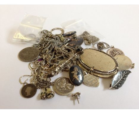 A small quantity of various silver jewellery and other silver items.