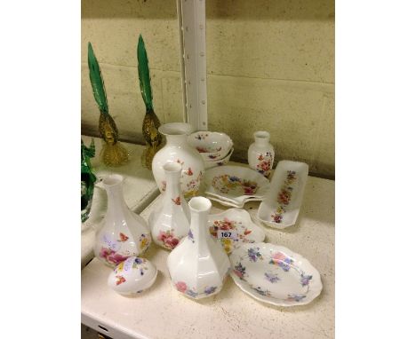 A collection of Poole Pottery bone china items decorated in the Cymbeline & Ophelia patterns.