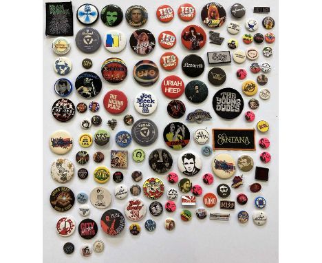 Approximately 117 assorted badges - many c 1970s/80. OMD, Genesis, Rolling Stones, Led Zeppelin, Deep Purple, Nazareth, Bad C
