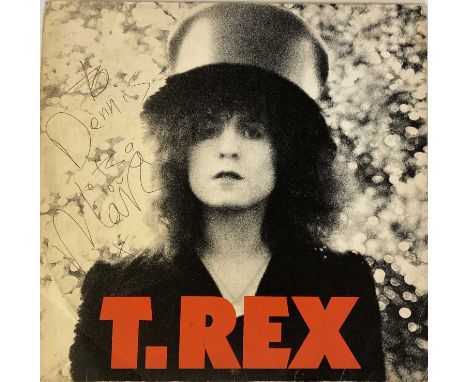 A copy of T.Rex - Slider (German issue, 86 294 IT, Ex condition record) signed to front of sleeve clearly and in good size wi