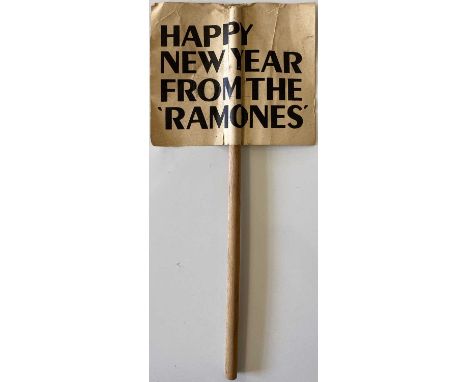 An original mini banner as distributed to the crowd at the Ramones concert at the Rainbow, London on 31st December 1977. Stic