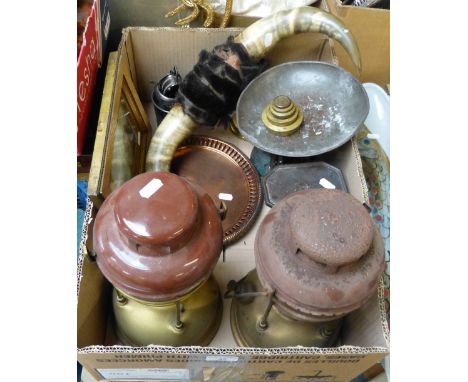 A set of kitchen scales with weights, a pair of cow's horns, two tilley lamps, silver dish, condiments, copper plates and a s