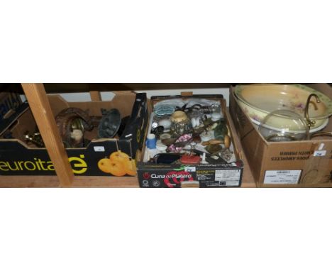 Two boxes of miscellaneous collectables including horse brasses, candlesticks, chamber sticks, door stops etc. and two wash b