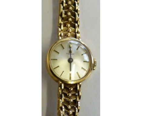 Tissot, a 9ct gold ladies manual wind wristwatch, gross weight 19.5gms