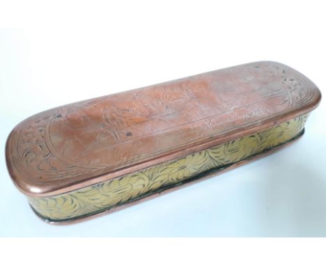 A 19th Century brass and copper snuff or tobacco box etched with figures, length 16cm.  