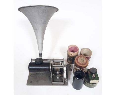 An Edison phonograph type cylinder record player with two records.  