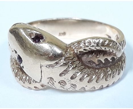 A 9ct gold ring formed as a snake with ruby coloured eyes, marked '9ct', gross wt. 6g, size R.  