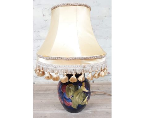 A Moorcroft pottery table lamp and shade, height 48cm. 