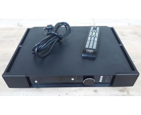 A Rega Elicit R stereo amplifier with remote, power lead and instruction manual.  