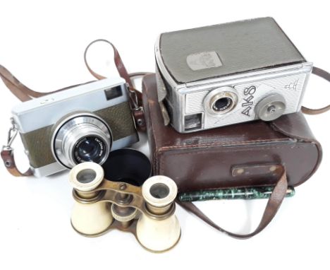 A mixed lot to include A Bell & Howell cased cine camera, a Synchro-Compur camera with Carl Zeiss Jena lense, Ivory and brass