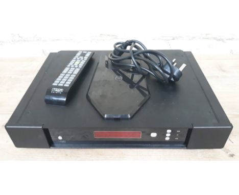 A Rega Saturn R CD player with power lead, remote and instruction manual.  