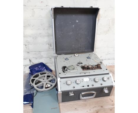 A vintage Ferrograph 4/con reel to reel recorder with two reels and instruction manual. 