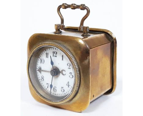 A small French brass alarm clock with enamel dial, 5cm x 5cm x 5cm.  