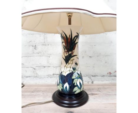 A Moorcroft pottery lamp with shade, height 42cm (to top of brass fitting).  